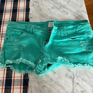Blue asphalt. Size 11. Teal shorts